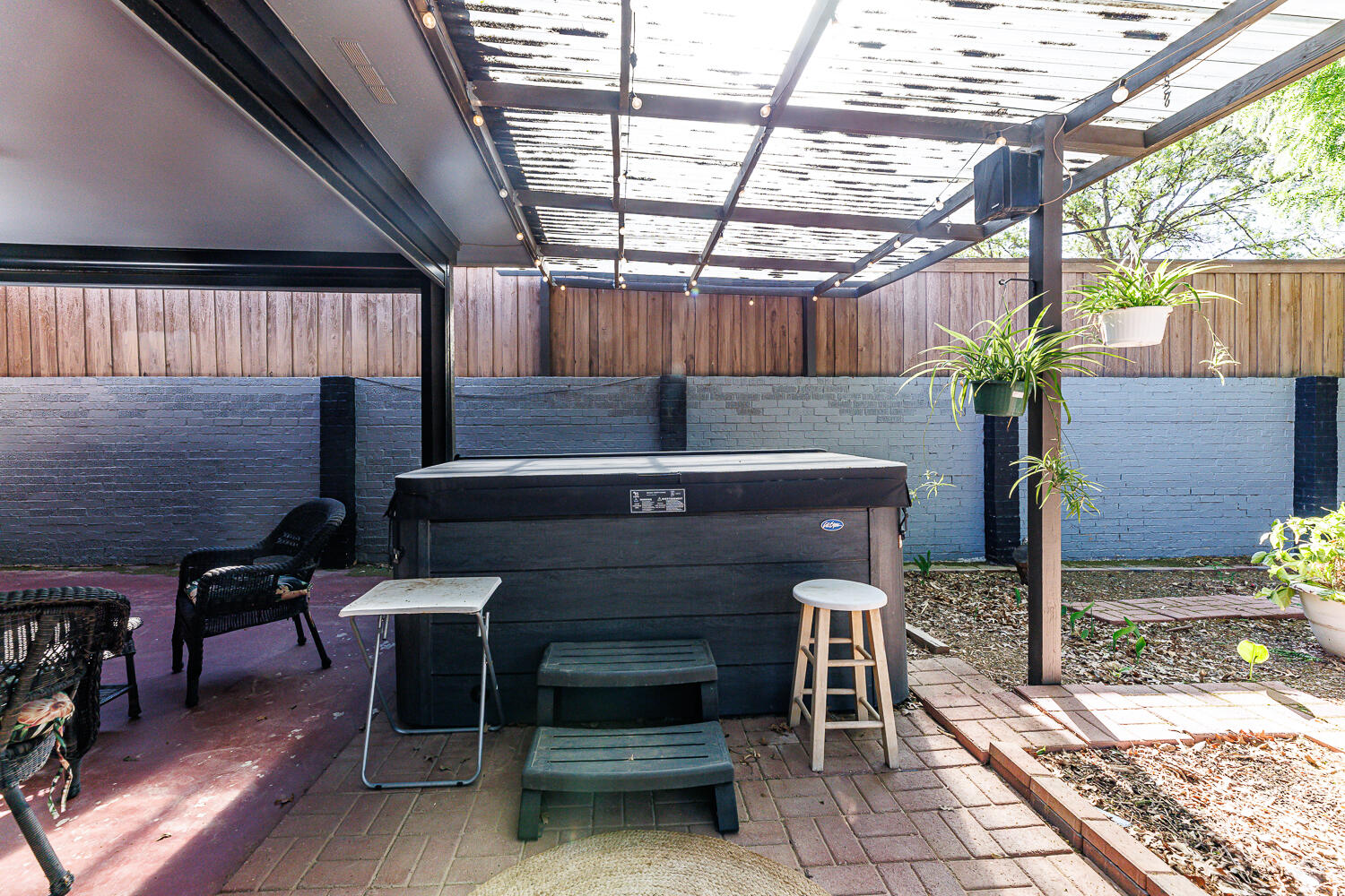 3713 95th Street Lubbock, TX 79423 - Photo 62 of 70 a view of a chairs and table in a patio