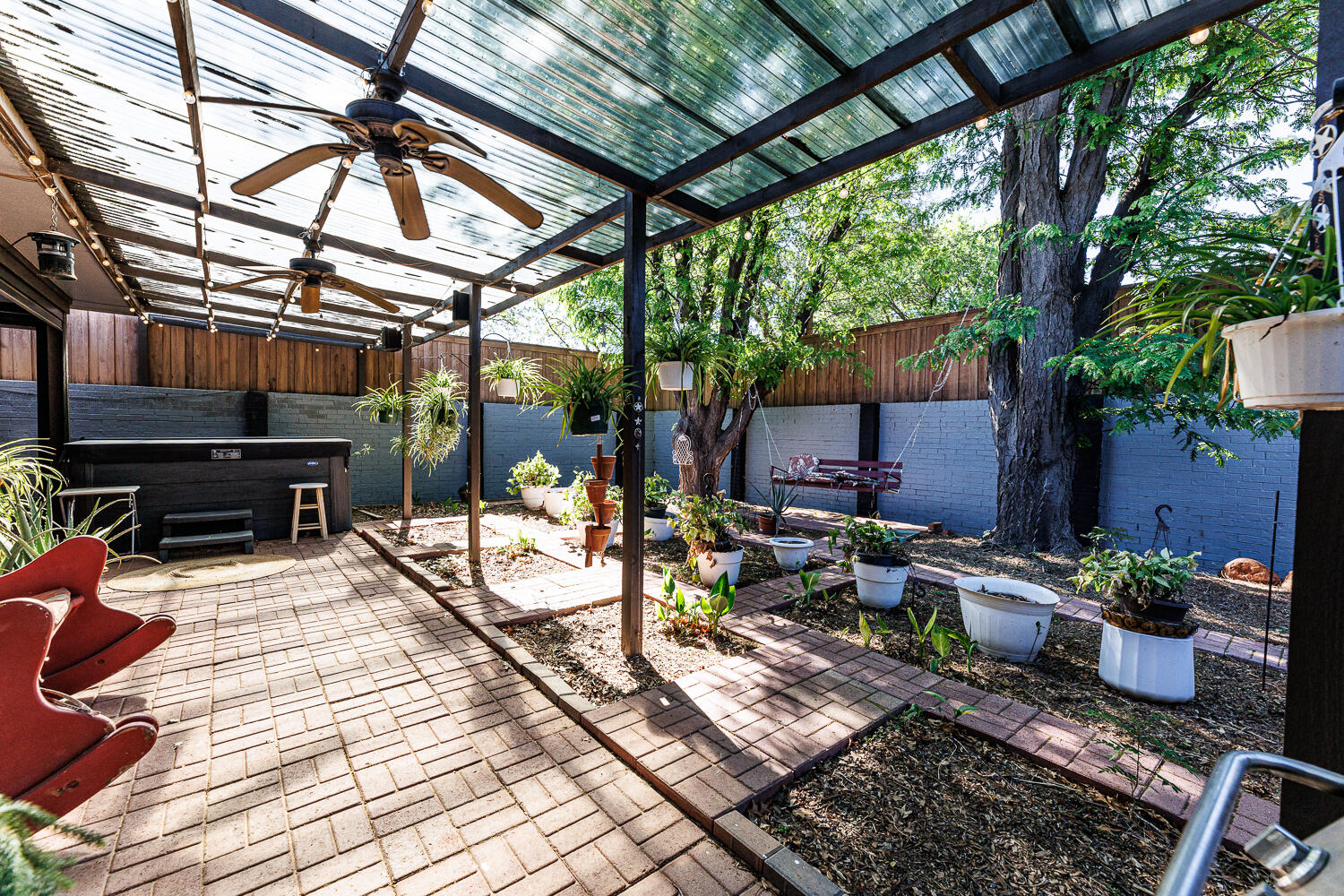 3713 95th Street Lubbock, TX 79423 - Photo 66 of 70 a view of a backyard with sitting area