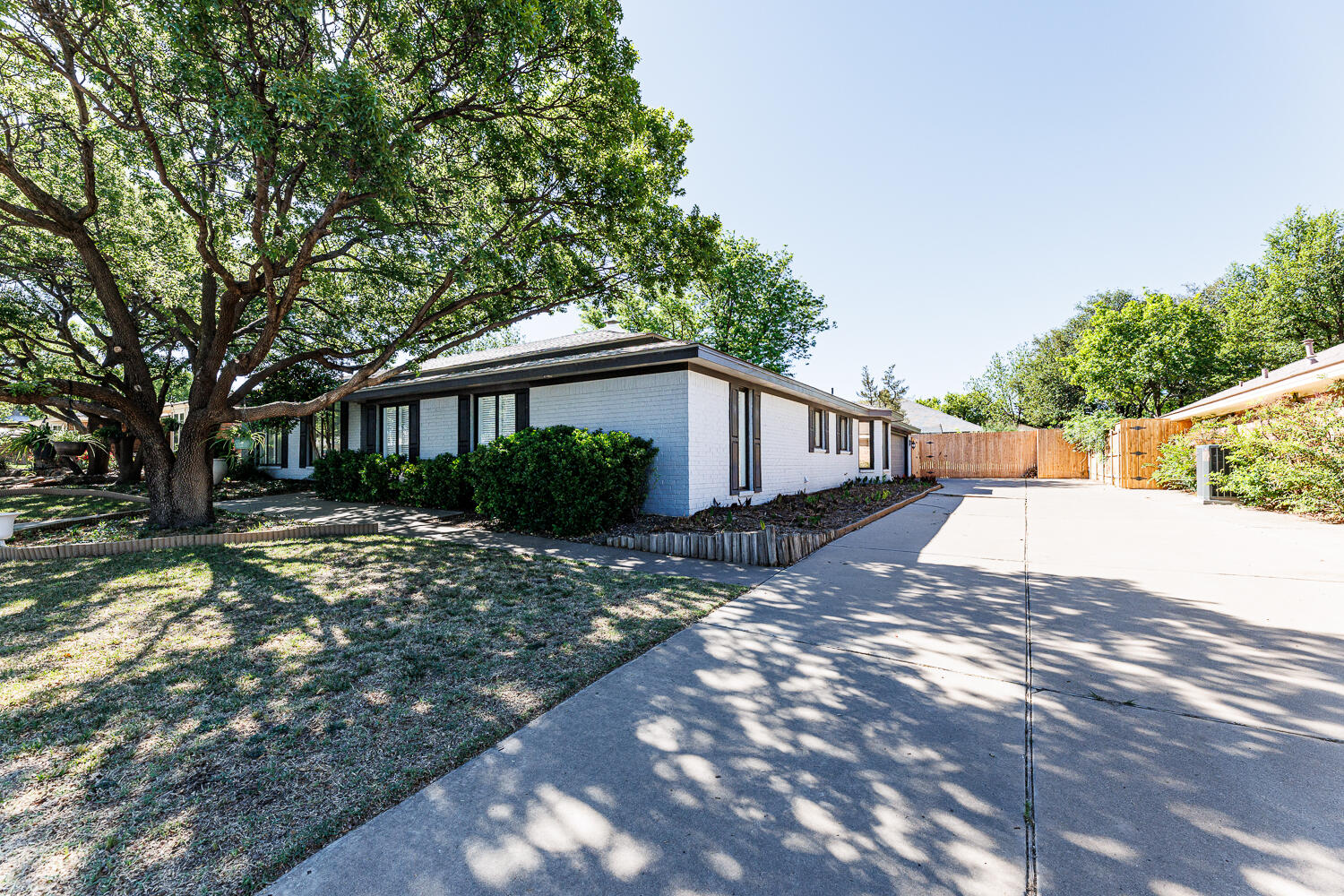 3713 95th Street Lubbock, TX 79423 - Photo 70 of 70 a view of a house with a yard