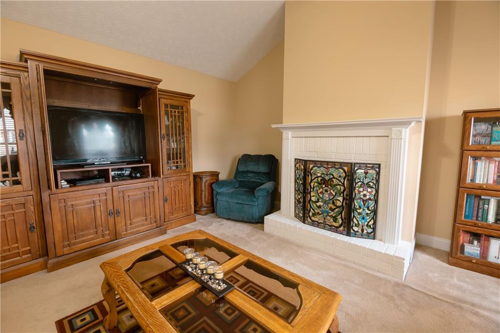 1200 Breckinridge Trail Winder, GA 30680 - Photo 4 of 37 a living room with furniture and a flat screen tv