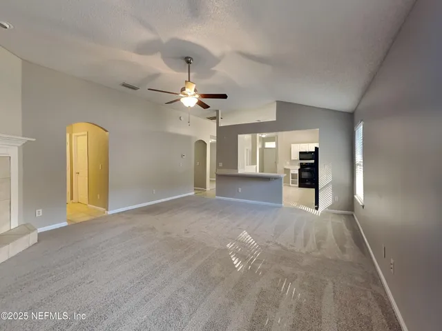 a view of livingroom and kitchen with livingroom