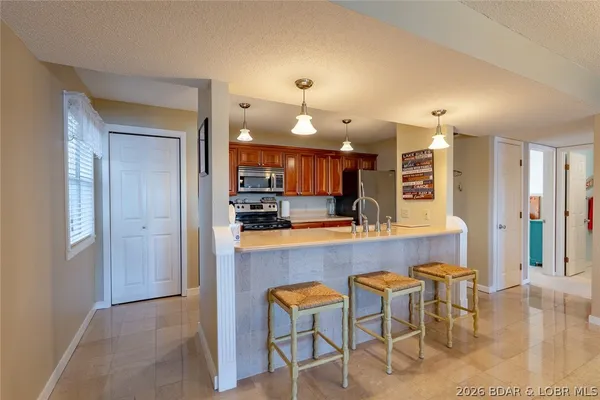 $229,000 | 6005 Baydy Peak Road, Unit 305, Osage Beach, MO 65065