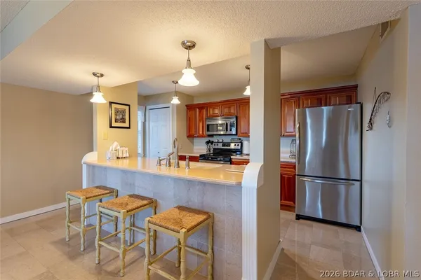 $229,000 | 6005 Baydy Peak Road, Unit 305, Osage Beach, MO 65065