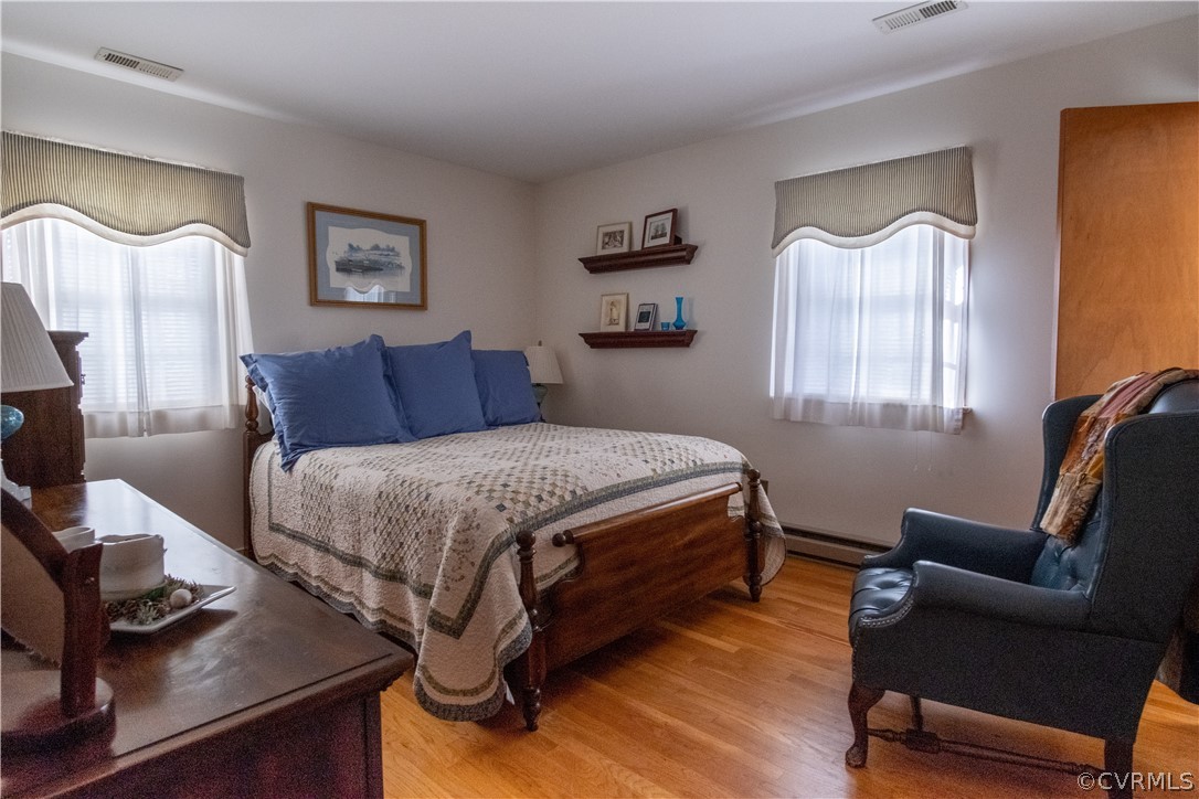 11500 Davelayne Road Midlothian, VA 23112 - Photo 11 of 23 a bedroom with a bed and a window
