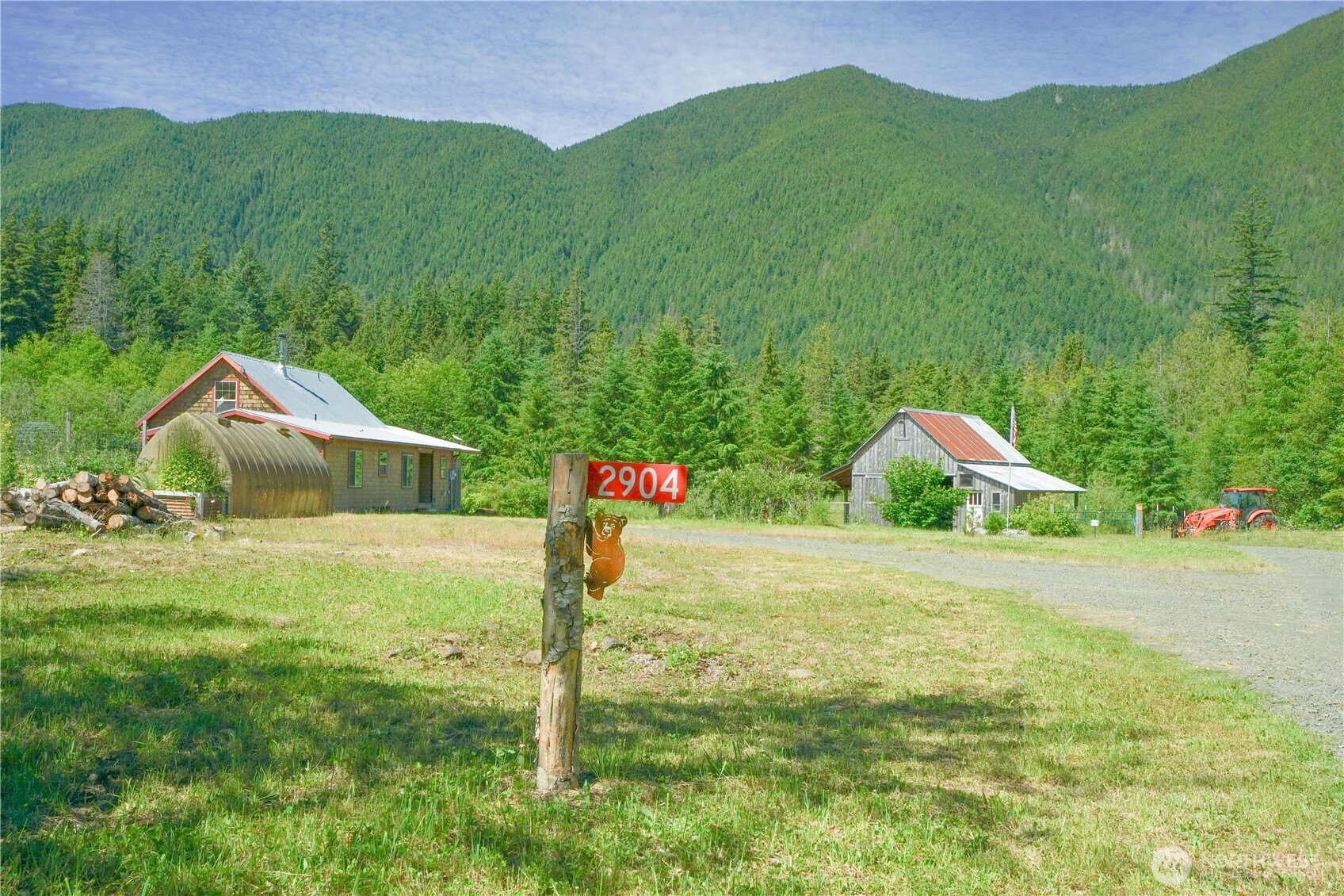 2904 Wildwood Road Quilcene, WA 98376 - Photo 39 of 39 a front view of a house with garden