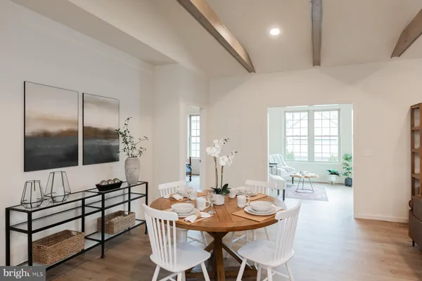 a kitchen with a sink stove and microwave