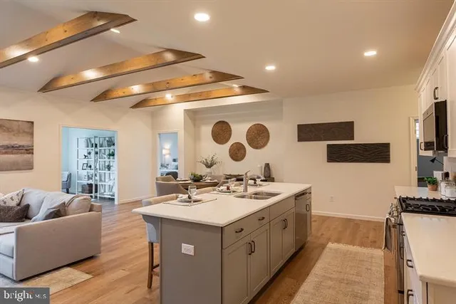 a spacious bathroom with a double vanity sink and a mirror