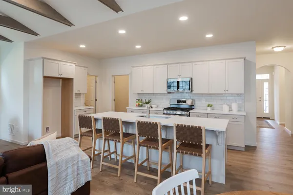 a view of a kitchen and dining room