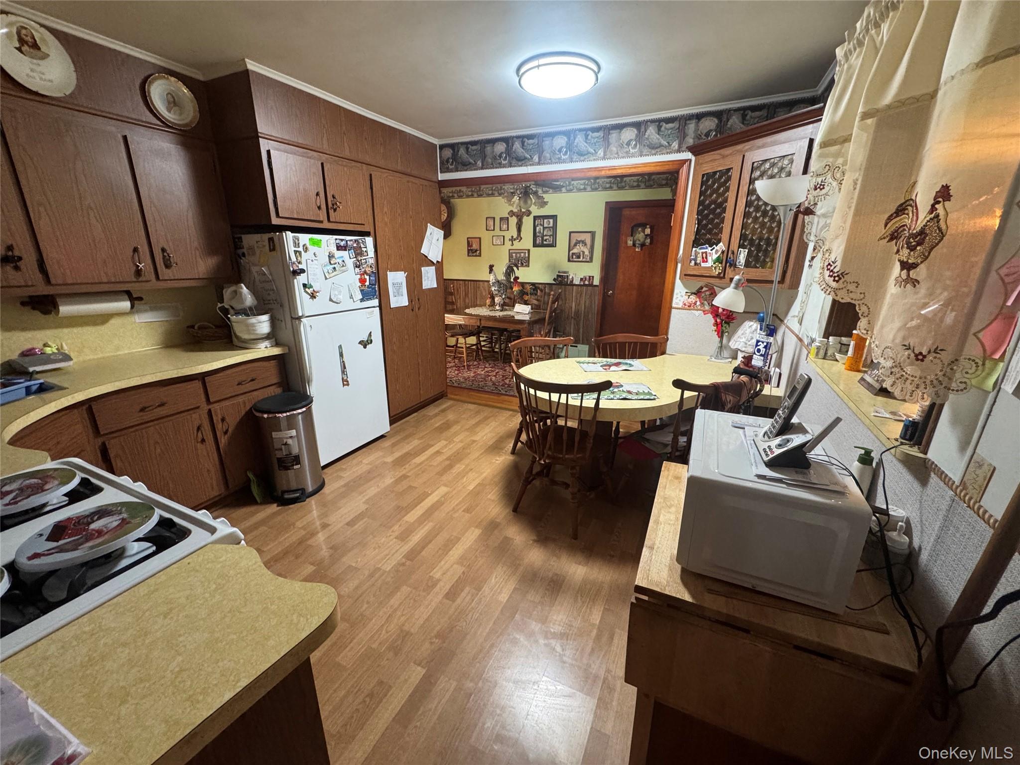367 Mt Eve Road Goshen, NY 10924 - Photo 12 of 37 a kitchen with sink cabinets and wooden floor