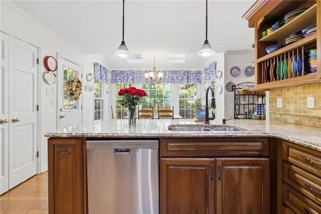 a kitchen with cabinets and a sink