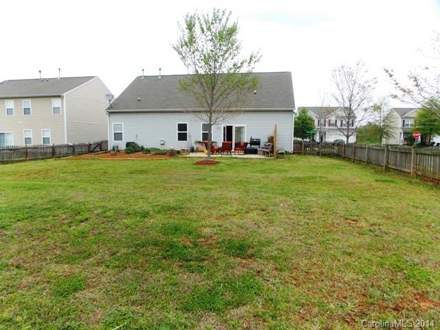 6423 Trotters Ridge Road, Unit 141 Charlotte, NC 28227 - Photo 22 of 22 a view of a house with a backyard
