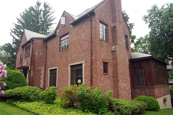 87 Hobart Road Newton, MA 02459 - Photo 3 of 22 a front view of a house with a garden