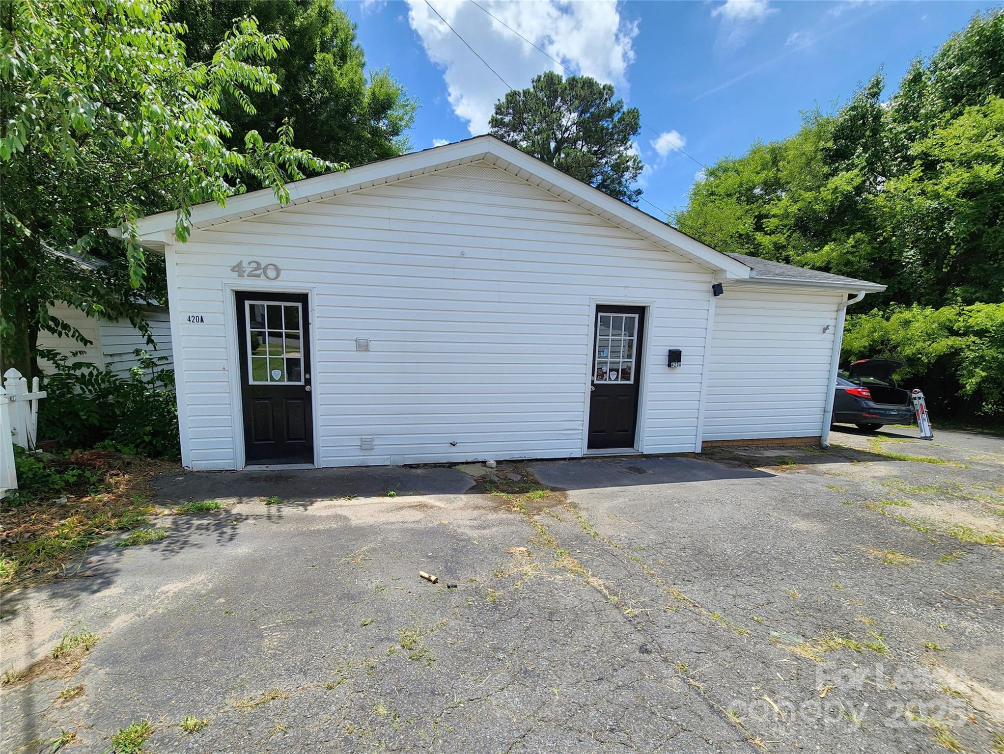 420 A Jackson Park Road Kannapolis, NC 28083 - Photo 1 of 20 a view of garage and yard