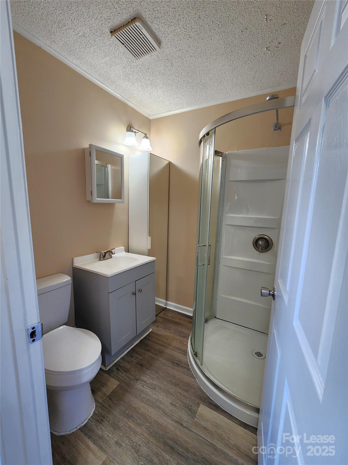 420 A Jackson Park Road Kannapolis, NC 28083 - Photo 11 of 20 a bathroom with a toilet sink and shower
