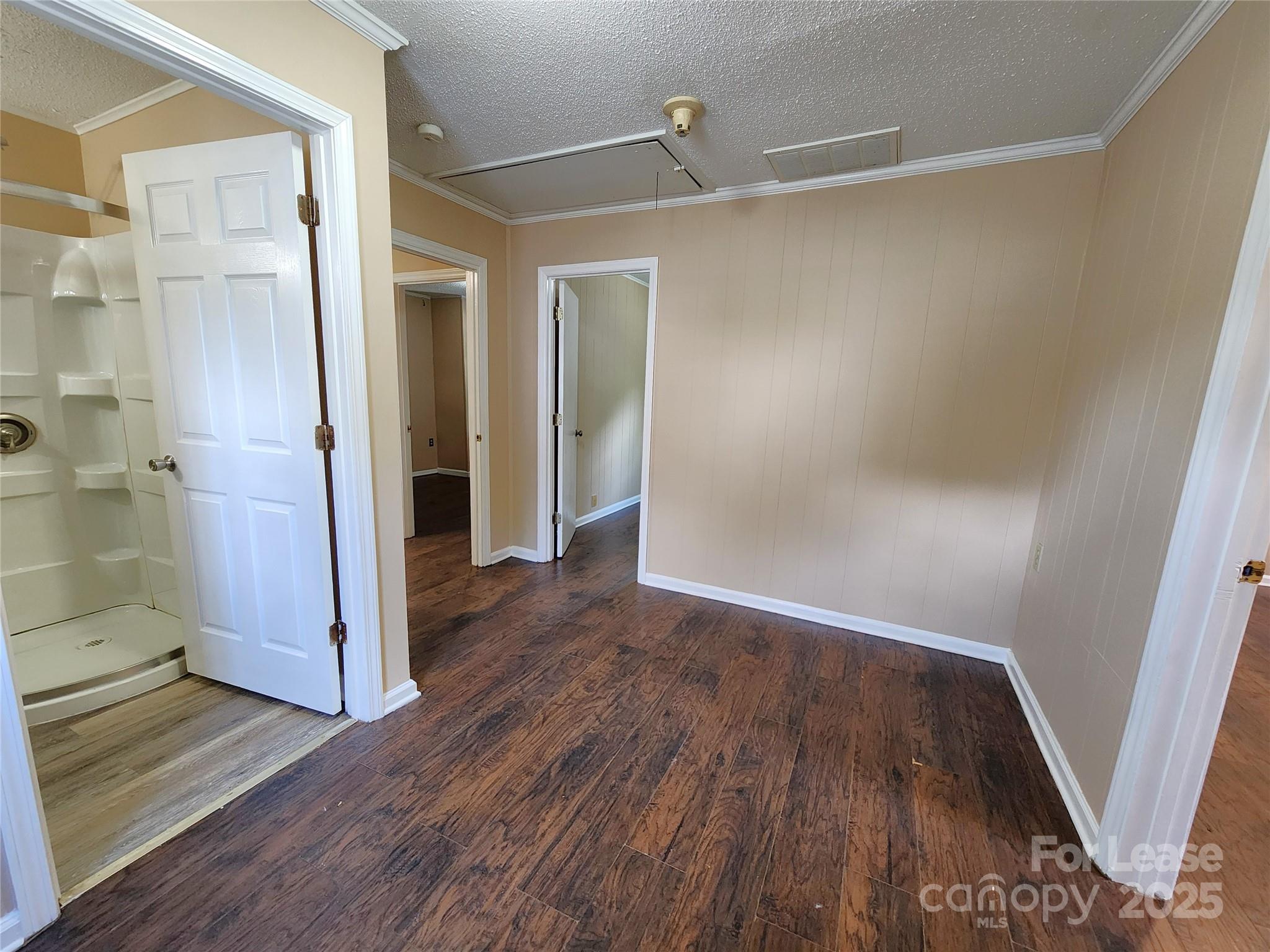 420 A Jackson Park Road Kannapolis, NC 28083 - Photo 2 of 20 a view of a hallway with wooden floor and closet