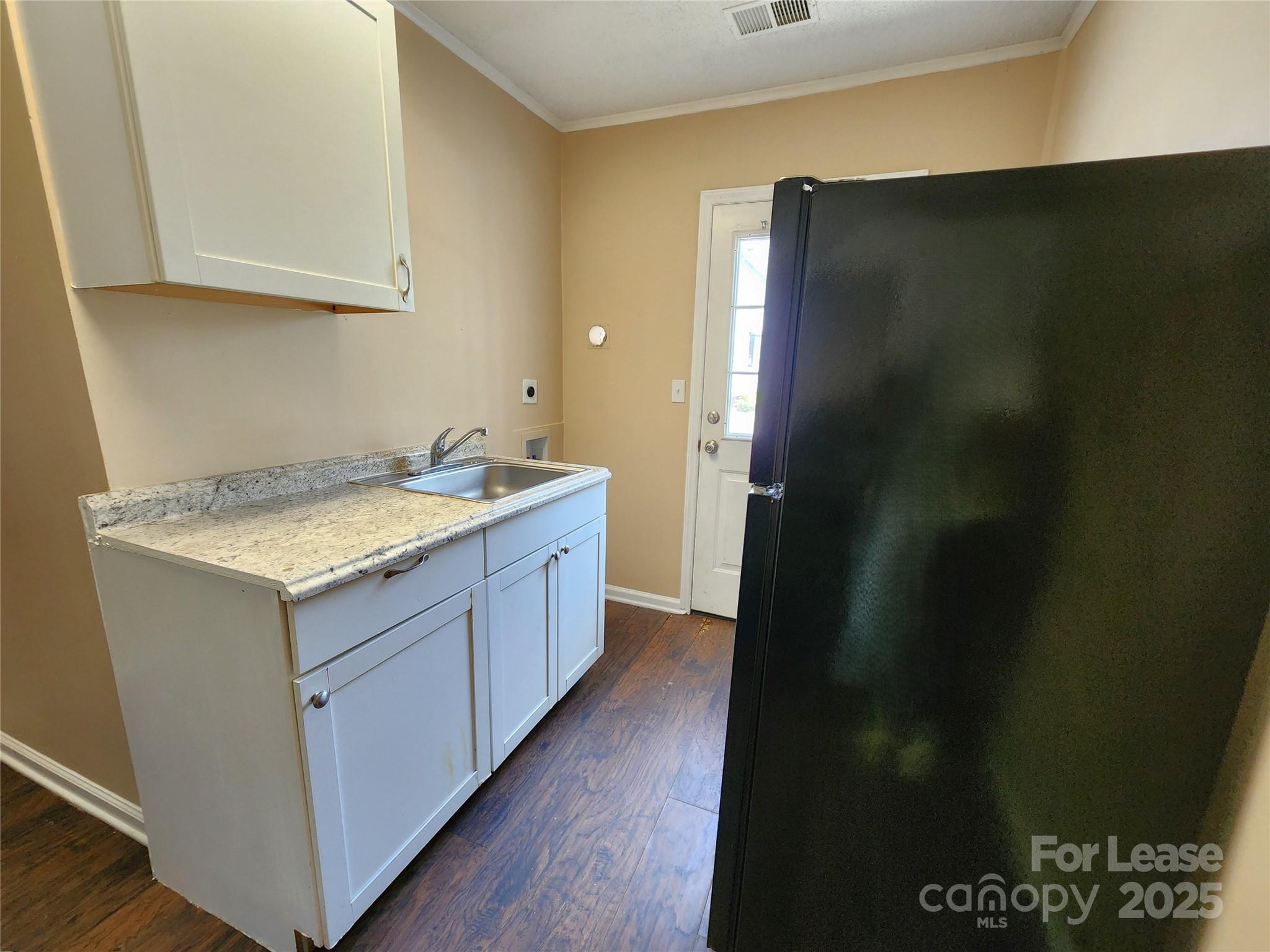 420 A Jackson Park Road Kannapolis, NC 28083 - Photo 6 of 20 a bathroom with a granite countertop sink and a mirror
