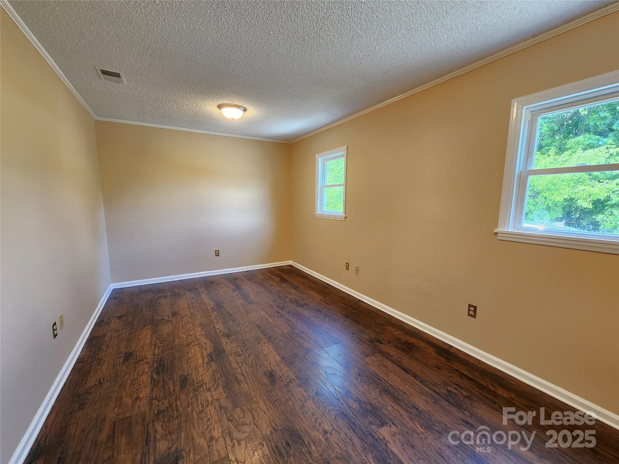 420 A Jackson Park Road Kannapolis, NC 28083 - Photo 9 of 20 a view of a room with wooden floor and window