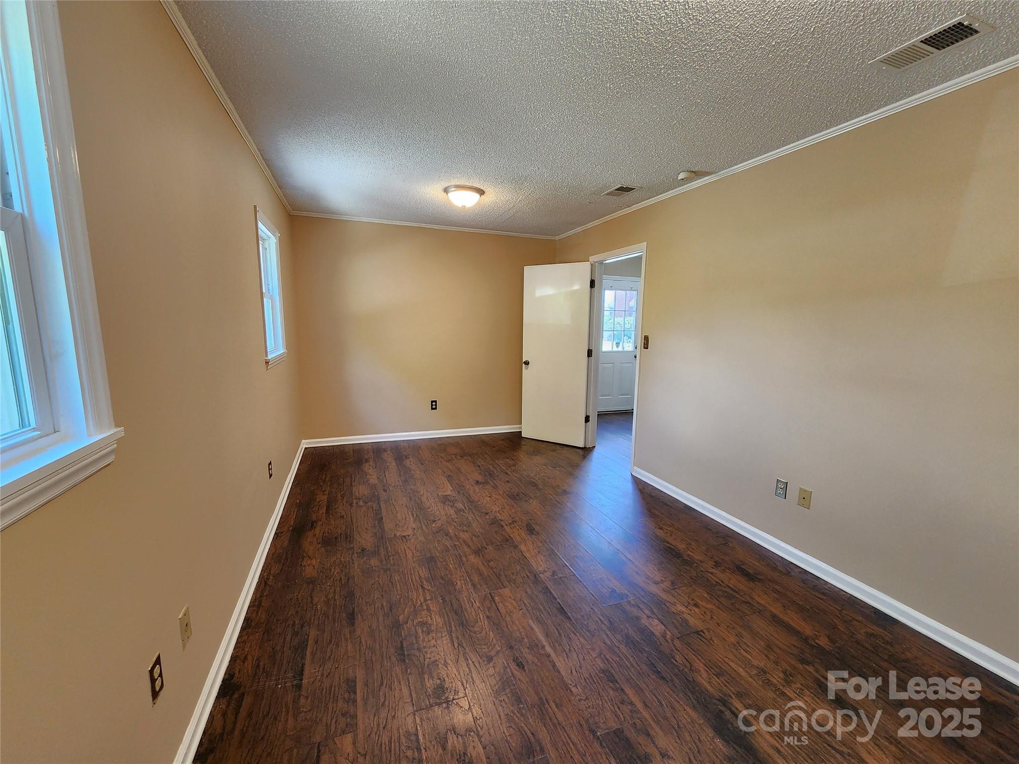 420 A Jackson Park Road Kannapolis, NC 28083 - Photo 10 of 20 a view of room with wooden floor