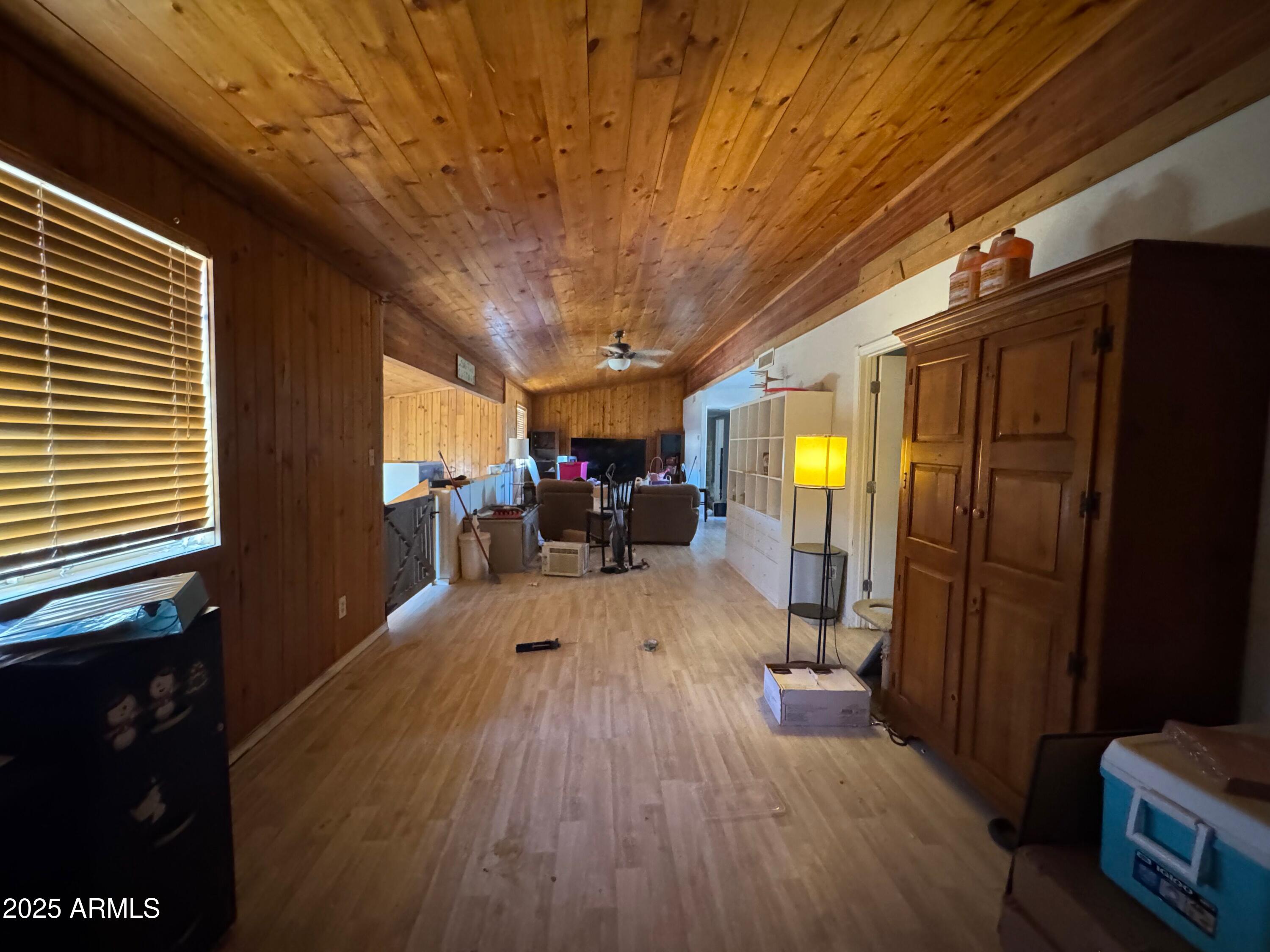 56163 West Papago Road Maricopa, AZ 85139 - Photo 16 of 44 a very nice looking room with a large window