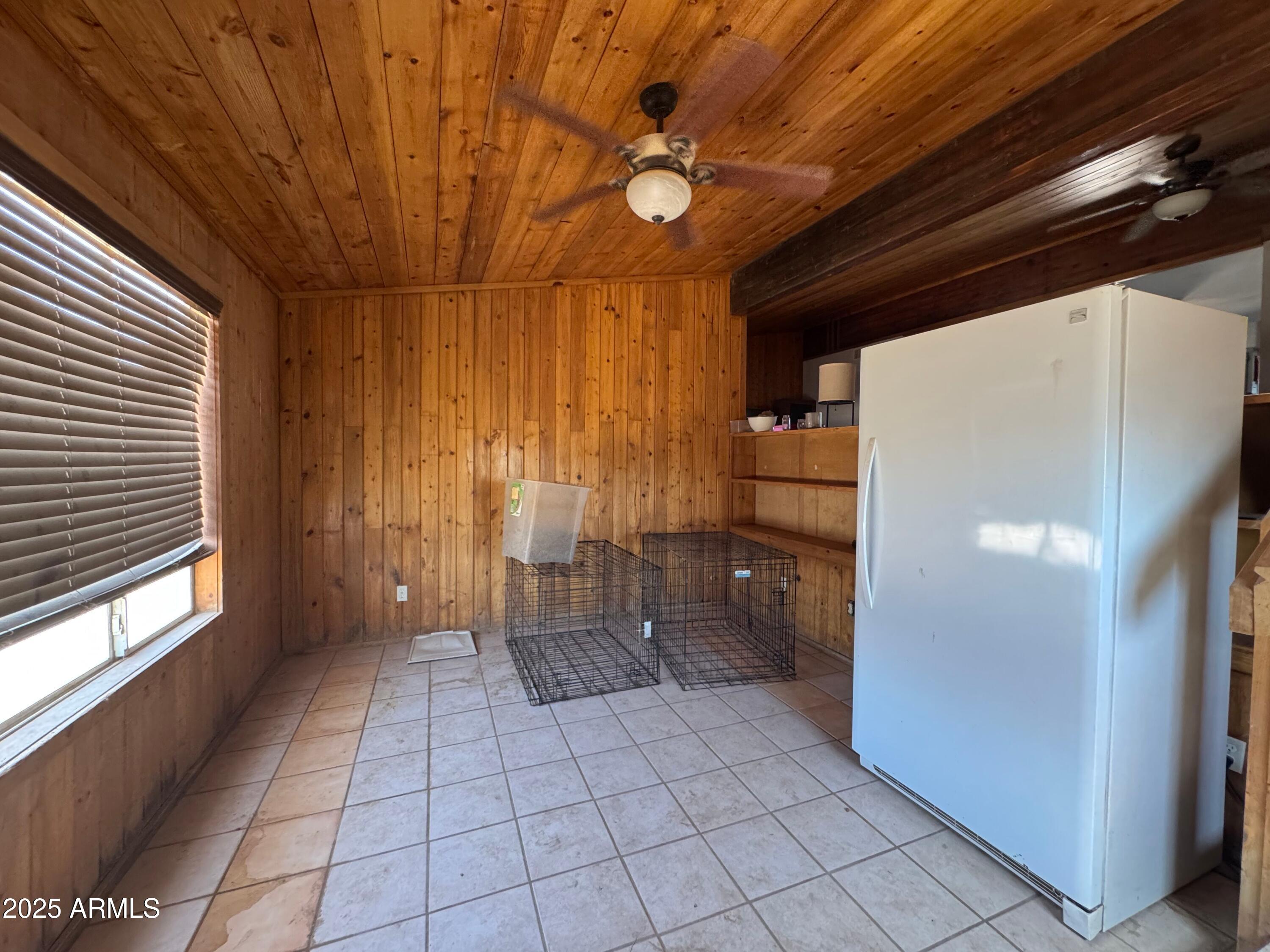 56163 West Papago Road Maricopa, AZ 85139 - Photo 17 of 44 a view of an empty room with a window