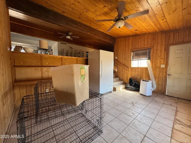 a kitchen with a stove and a refrigerator