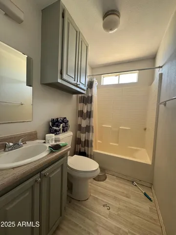 a room with furniture and wooden floor