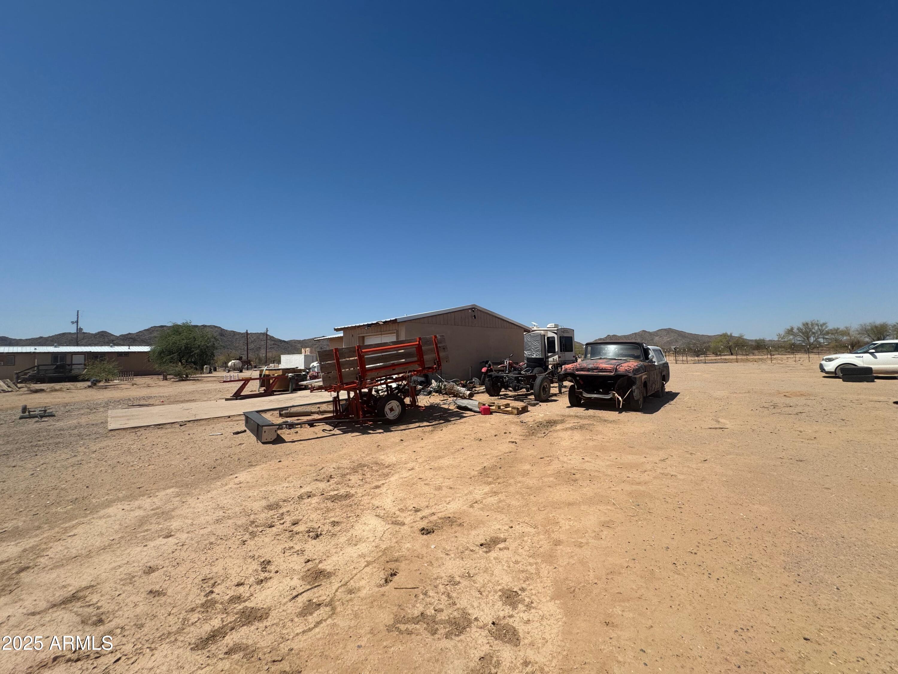56163 West Papago Road Maricopa, AZ 85139 - Photo 28 of 44 a view of a ocean view with nearby beach