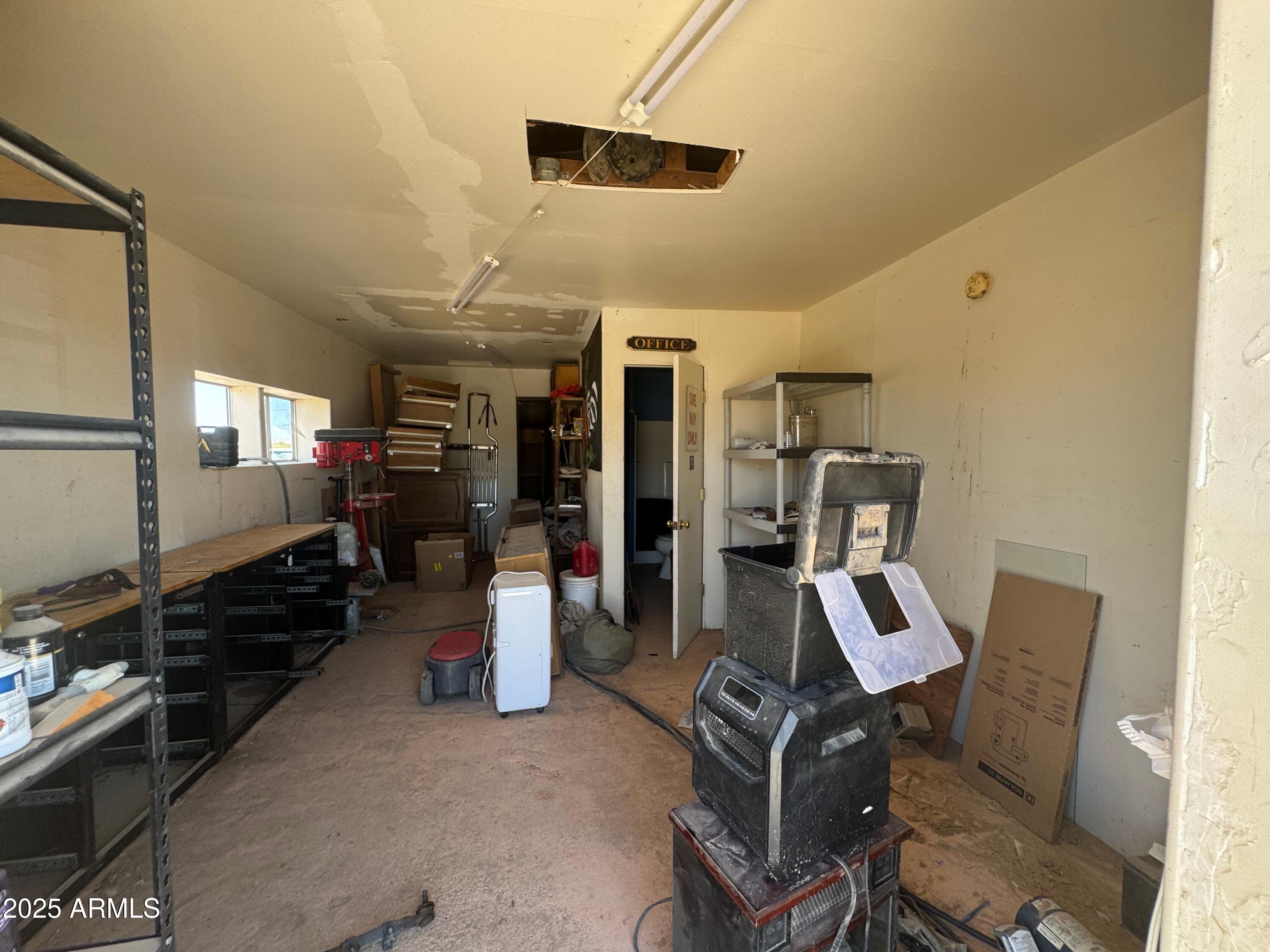 56163 West Papago Road Maricopa, AZ 85139 - Photo 30 of 44 a view of a room with gym equipment