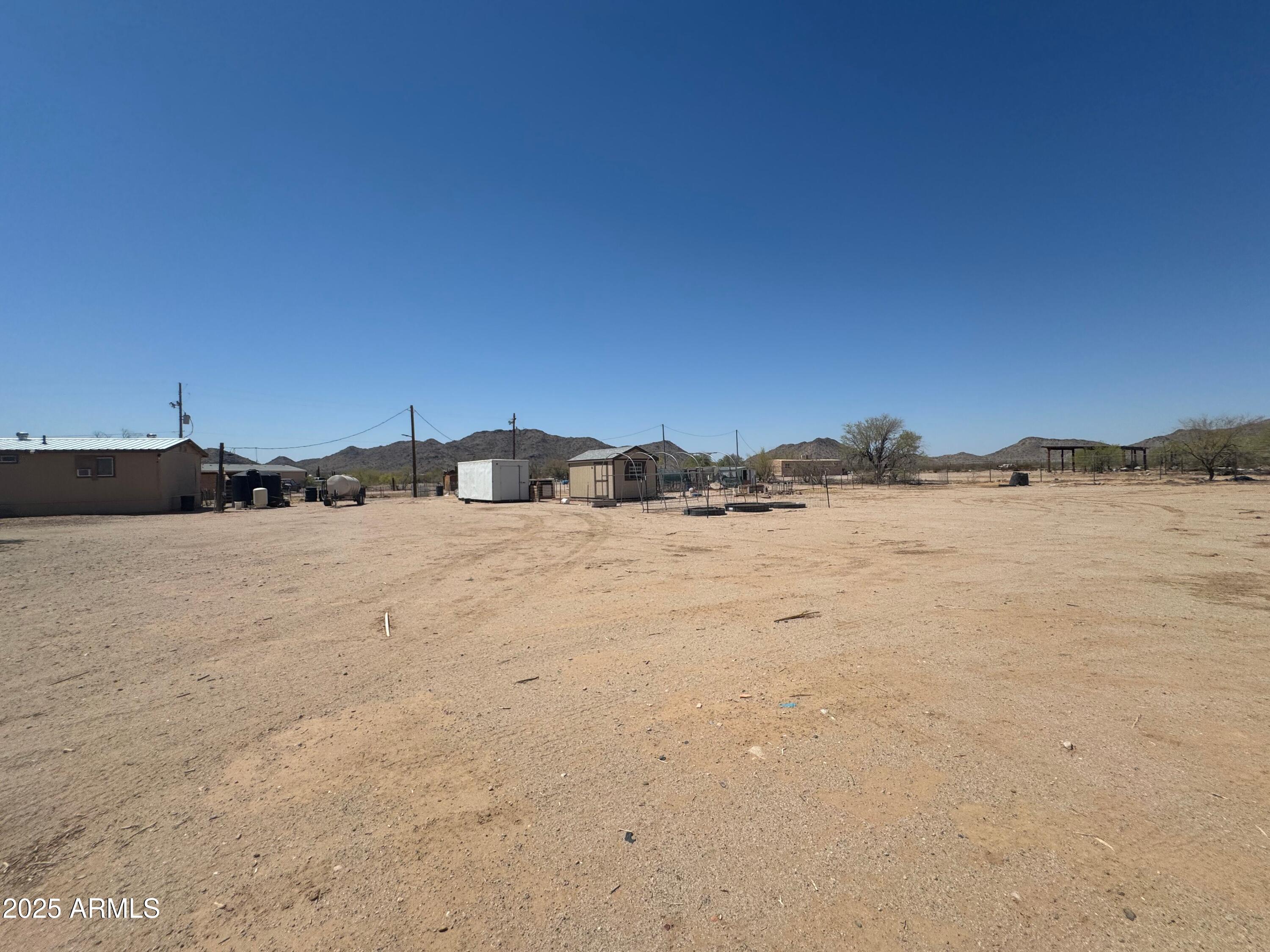 56163 West Papago Road Maricopa, AZ 85139 - Photo 36 of 44 a view of ocean view with beach