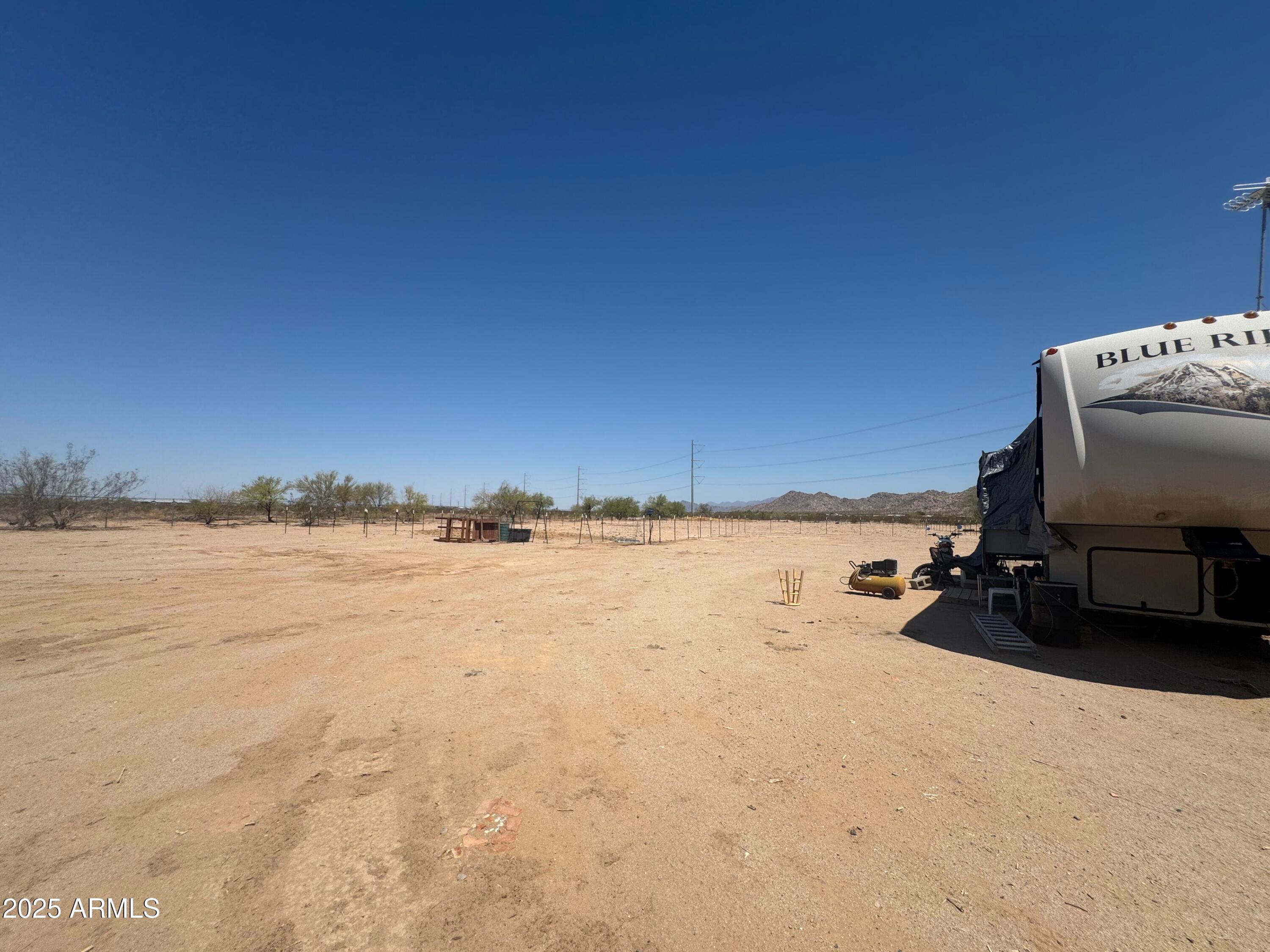 56163 West Papago Road Maricopa, AZ 85139 - Photo 37 of 44 a view of an ocean and beach