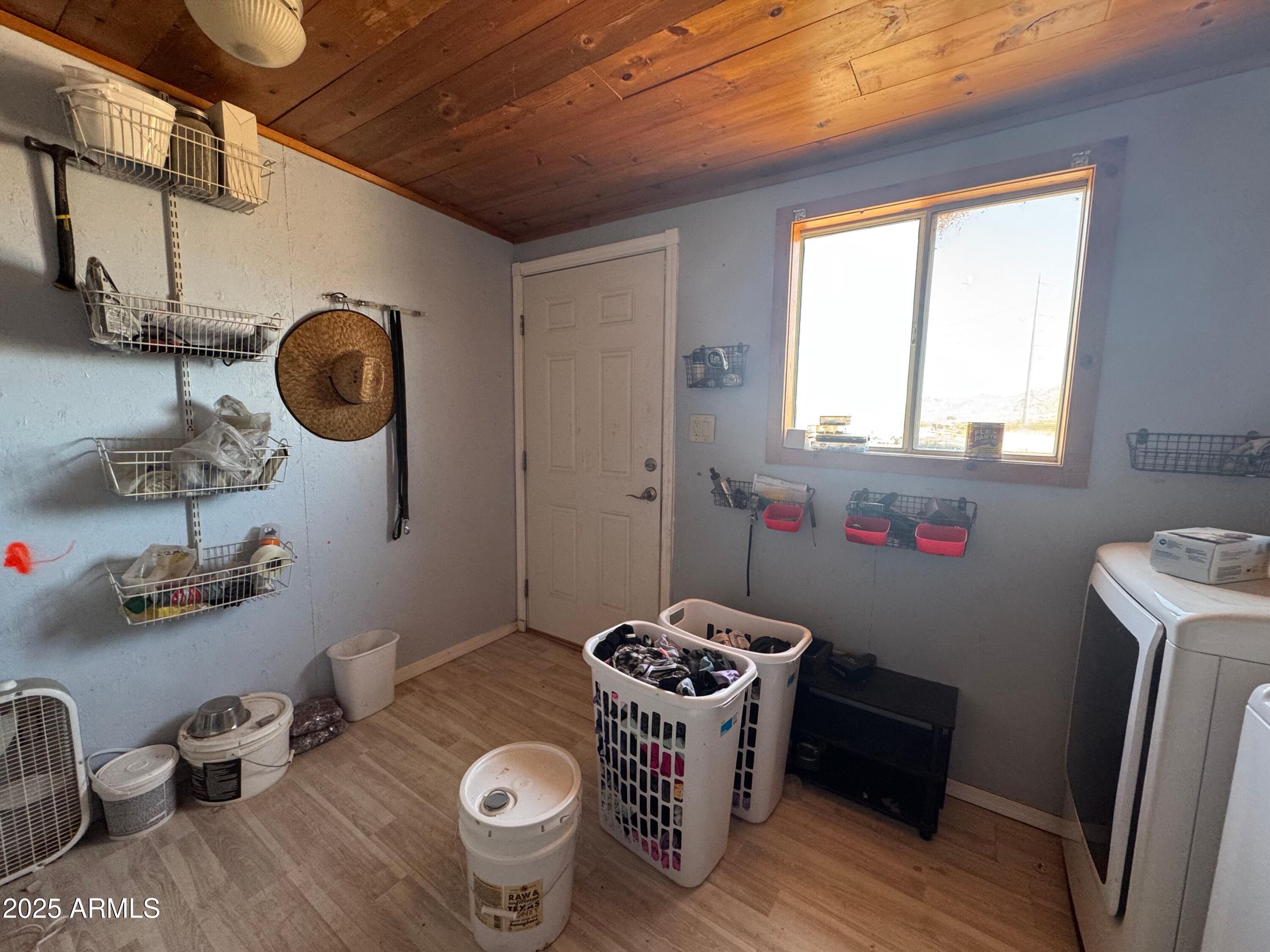 56163 West Papago Road Maricopa, AZ 85139 - Photo 4 of 44 a room with furniture and window