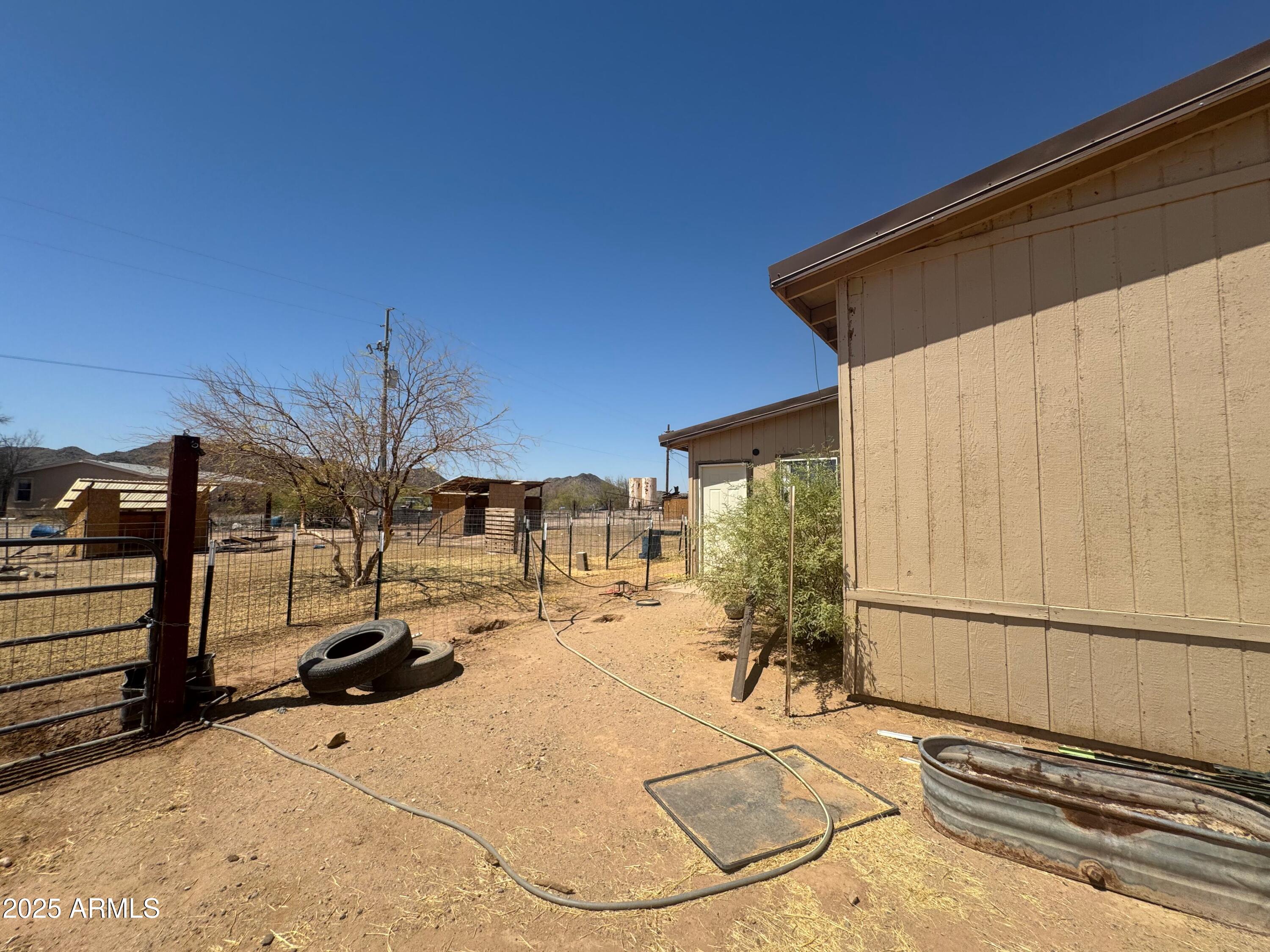 56163 West Papago Road Maricopa, AZ 85139 - Photo 44 of 44 a view of a backyard