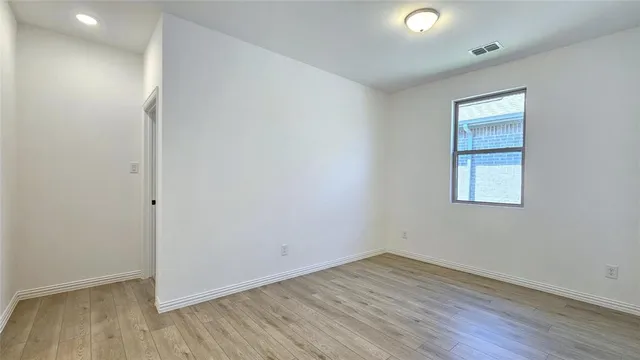 a bathroom with a double vanity sink and mirror
