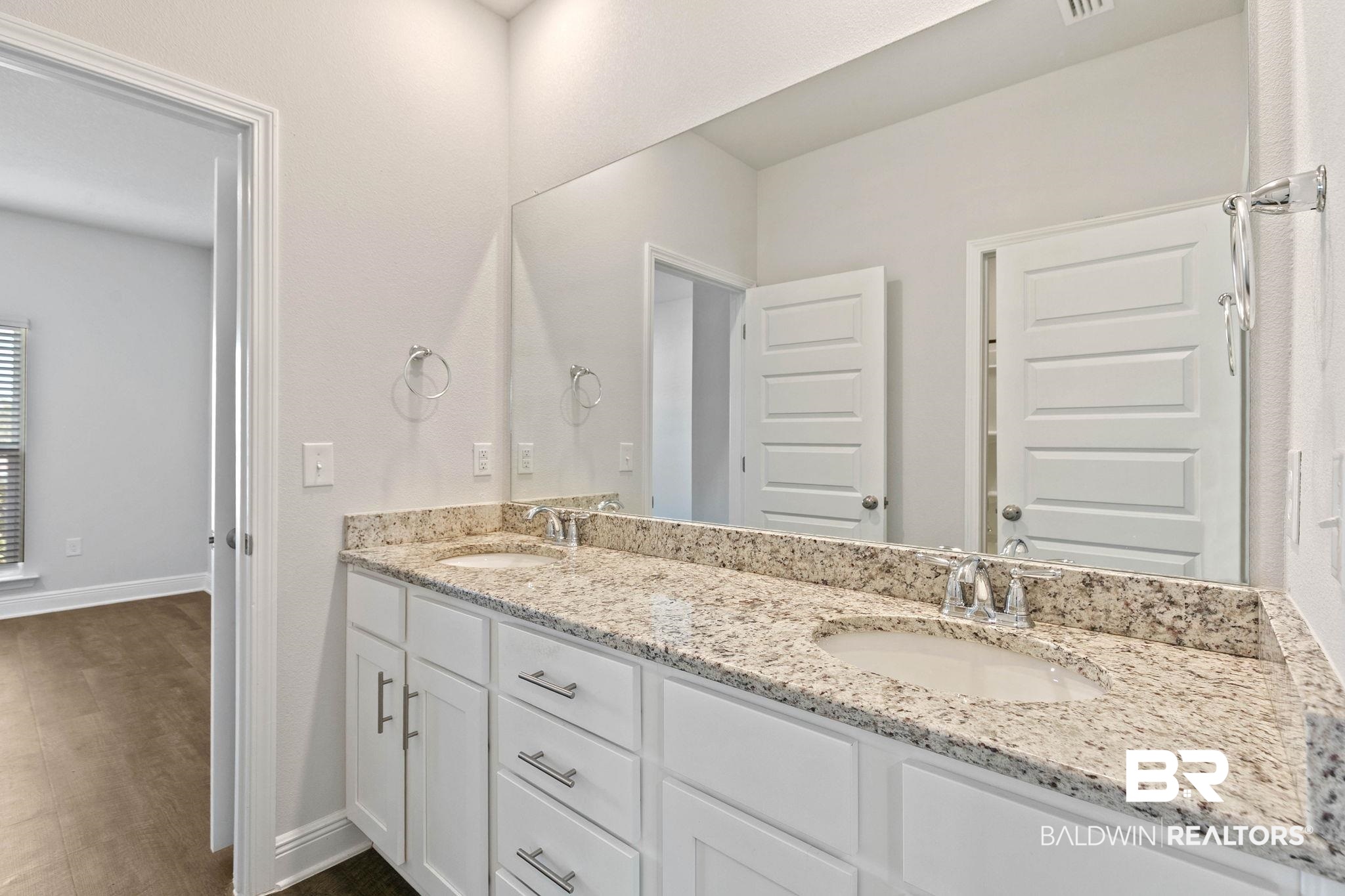 9448 Amethyst Drive Daphne, AL 36526 - Photo 36 of 61 Bathroom featuring double vanity and dark wood finished floors