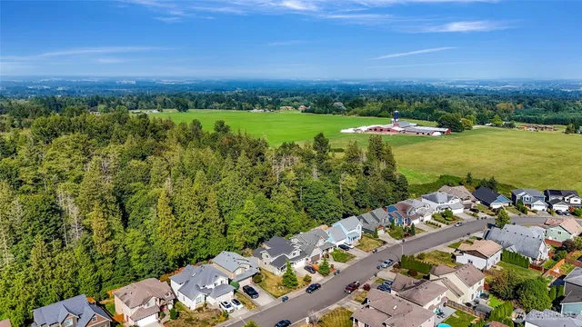 a view of a city with an ocean