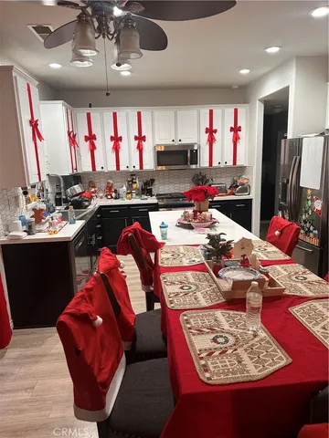 a room with furniture and a flat screen tv