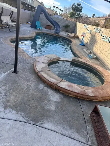 a view of a backyard of a house