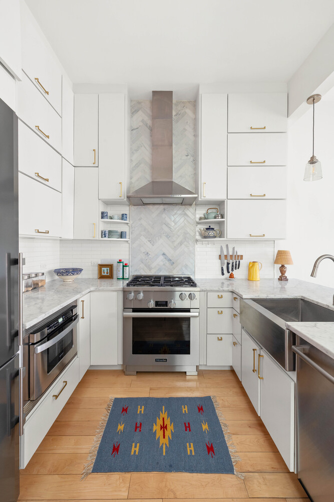 541 Henry Street, Unit D Brooklyn, NY 11231 - Photo 4 of 11 a kitchen with stainless steel appliances granite countertop a stove and a sink