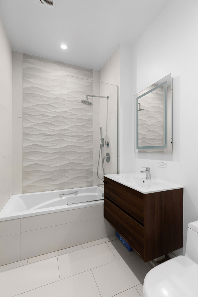 541 Henry Street, Unit D Brooklyn, NY 11231 - Photo 9 of 11 a bathroom with a sink and a bathtub