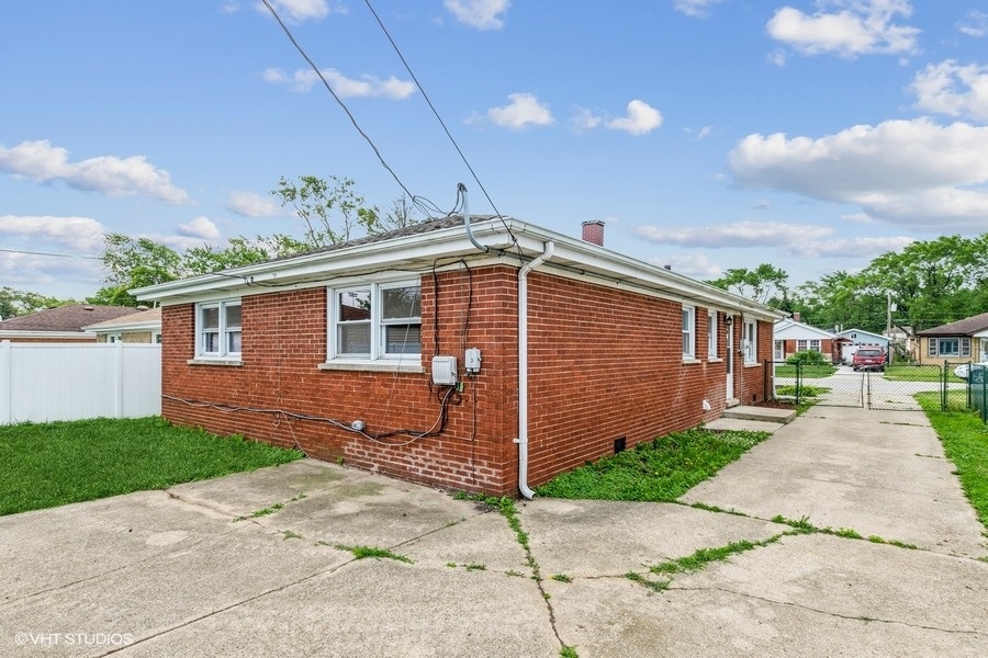 3914 153rd Street Midlothian, IL 60445 - Photo 17 of 17 a front view of a house with a yard