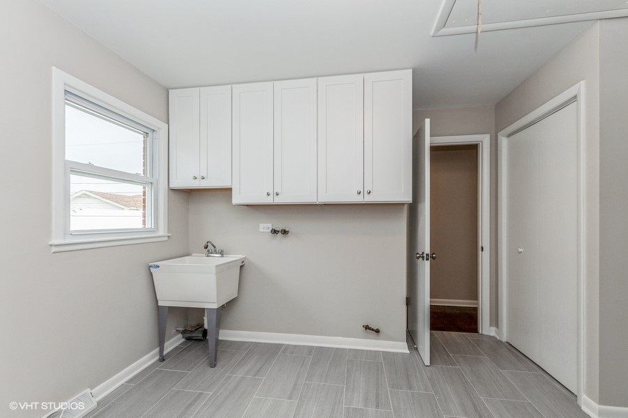 3914 153rd Street Midlothian, IL 60445 - Photo 9 of 17 a view of room with a workspace wooden floor and a window