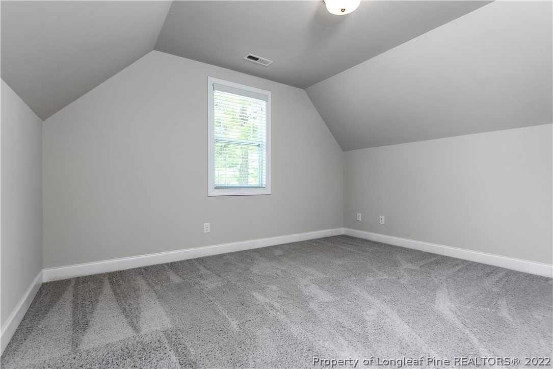 303 Falling Water Road Spring Lake, NC 28390 - Photo 31 of 33 an empty room with a window