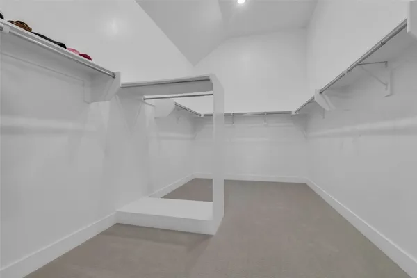 a en suite bathroom with a sink a mirror and a bathtub
