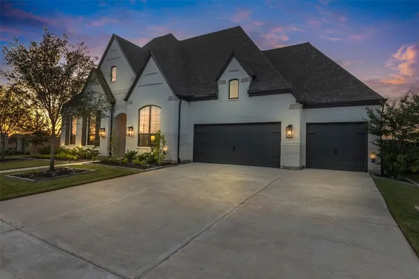 a view of an empty room with windows