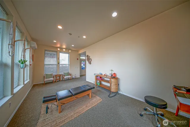 a living room with furniture and a table