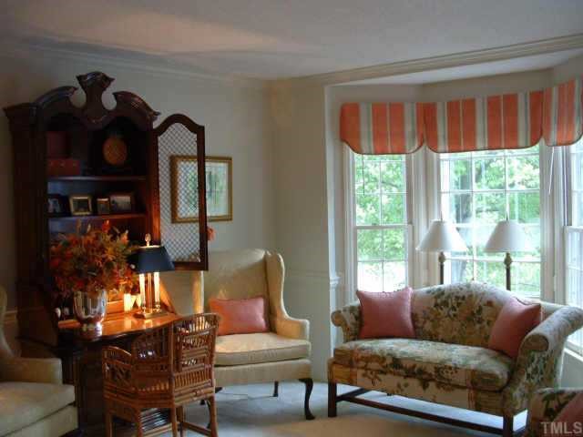 6729 Queen Annes Drive Raleigh, NC 27613 - Photo 3 of 9 a living room with furniture and a large window