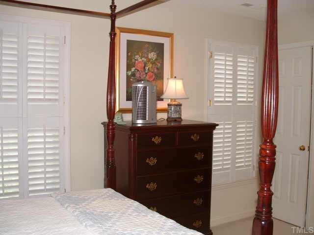 6729 Queen Annes Drive Raleigh, NC 27613 - Photo 6 of 9 a bathroom with a sink vanity and a mirror