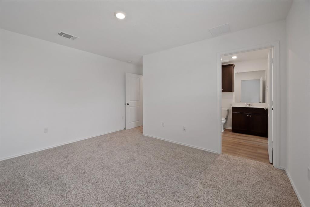 12213 Rising Moon Lane Del Valle, TX 78617 - Photo 7 of 11 a view of an empty room