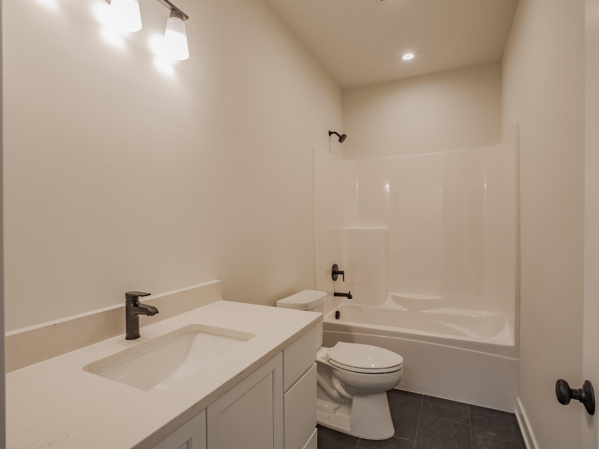 244 Sawgrass Drive Crown Point, IN 46307 - Photo 13 of 19 a bathroom with a sink a toilet and shower