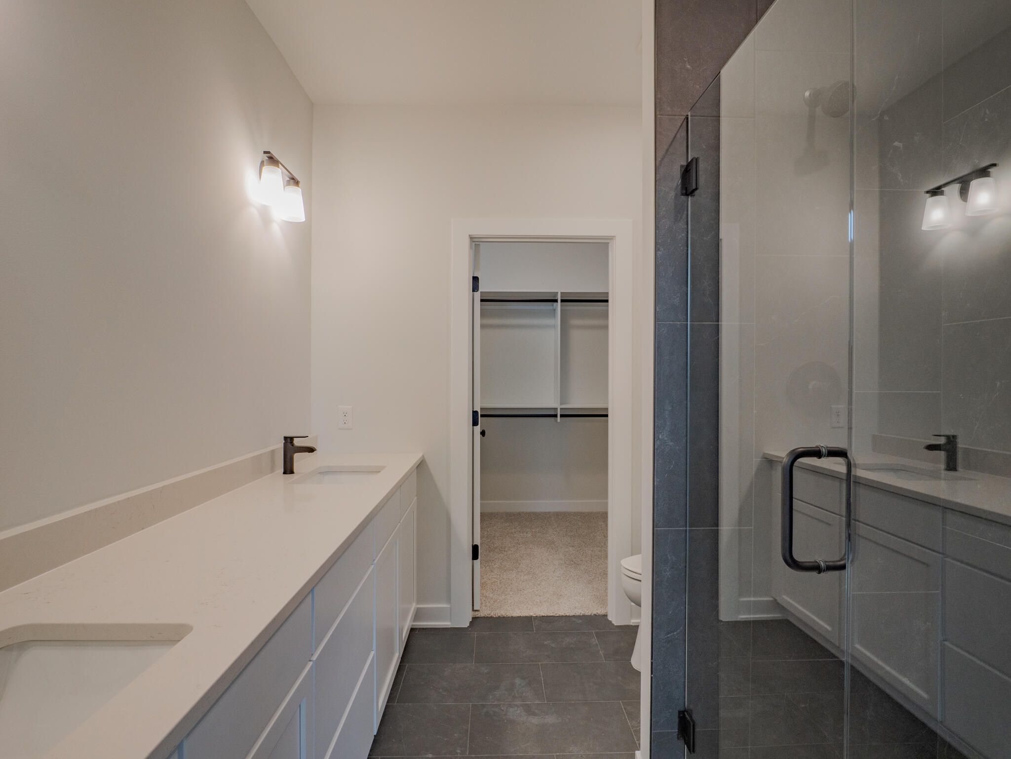 244 Sawgrass Drive Crown Point, IN 46307 - Photo 16 of 19 a bathroom with a tub sink and mirror